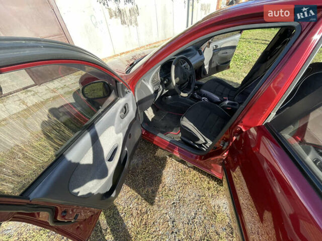 Червоний Деу Ланос, об'ємом двигуна 1.5 л та пробігом 309 тис. км за 2300 $, фото 6 на Automoto.ua