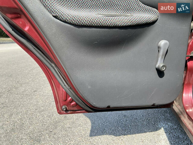 Красный Дэу Ланос, объемом двигателя 1.5 л и пробегом 158 тыс. км за 2500 $, фото 7 на Automoto.ua