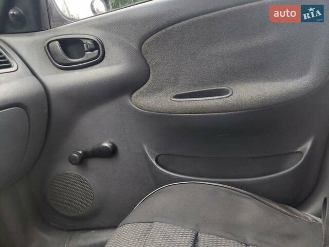 Красный Дэу Ланос, объемом двигателя 1.5 л и пробегом 309 тыс. км за 2000 $, фото 8 на Automoto.ua