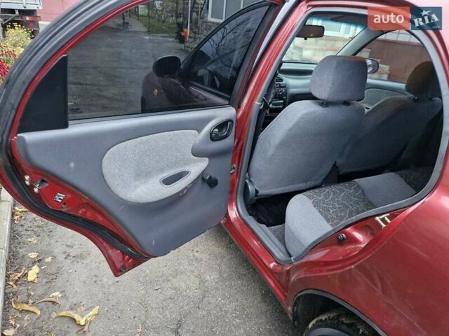 Красный Дэу Ланос, объемом двигателя 1.6 л и пробегом 163 тыс. км за 2650 $, фото 11 на Automoto.ua