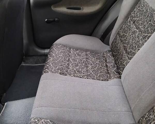 Красный Дэу Ланос, объемом двигателя 1.5 л и пробегом 191 тыс. км за 2500 $, фото 3 на Automoto.ua