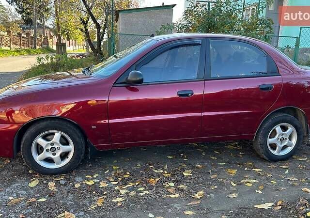 Красный Дэу Ланос, объемом двигателя 1.6 л и пробегом 216 тыс. км за 1900 $, фото 5 на Automoto.ua