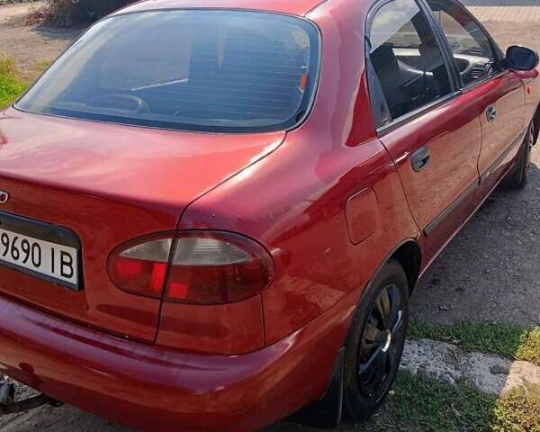 Червоний Деу Ланос, об'ємом двигуна 1.6 л та пробігом 231 тис. км за 1700 $, фото 1 на Automoto.ua