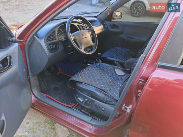 Красный Дэу Ланос, объемом двигателя 1.5 л и пробегом 107 тыс. км за 2900 $, фото 17 на Automoto.ua