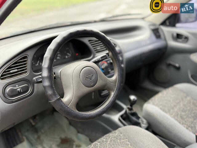 Красный Дэу Ланос, объемом двигателя 1.5 л и пробегом 224 тыс. км за 1750 $, фото 7 на Automoto.ua