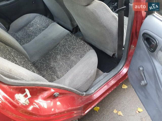 Красный Дэу Ланос, объемом двигателя 1.5 л и пробегом 270 тыс. км за 2450 $, фото 9 на Automoto.ua