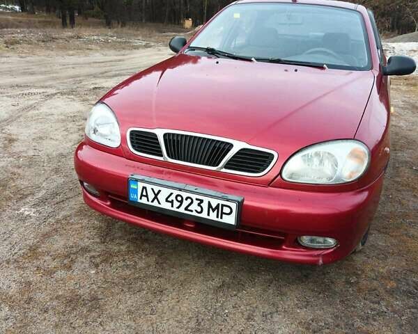 Красный Дэу Ланос, объемом двигателя 1.5 л и пробегом 256 тыс. км за 2900 $, фото 1 на Automoto.ua