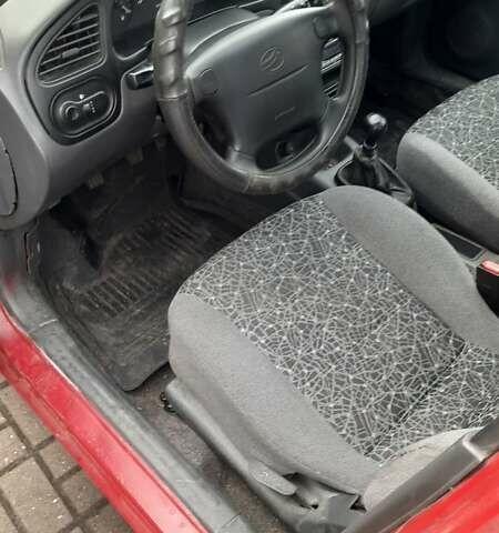 Деу Ланос 2006 у Запоріжжя на Automoto.ua Червоний Деу Ланос, об'ємом двигуна 1.5 л та пробігом 151 тис. км за 1399 $, фото 11 на Automoto.ua