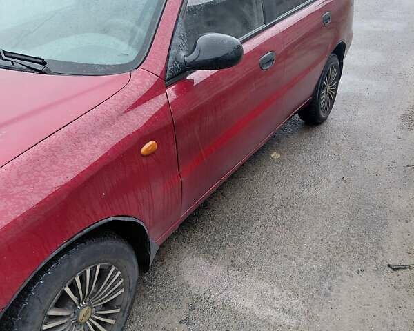 Красный Дэу Ланос, объемом двигателя 1.5 л и пробегом 309 тыс. км за 2000 $, фото 2 на Automoto.ua