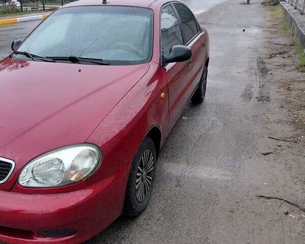 Красный Дэу Ланос, объемом двигателя 1.5 л и пробегом 309 тыс. км за 2000 $, фото 1 на Automoto.ua