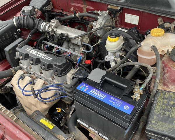 Красный Дэу Ланос, объемом двигателя 1.5 л и пробегом 250 тыс. км за 1450 $, фото 7 на Automoto.ua