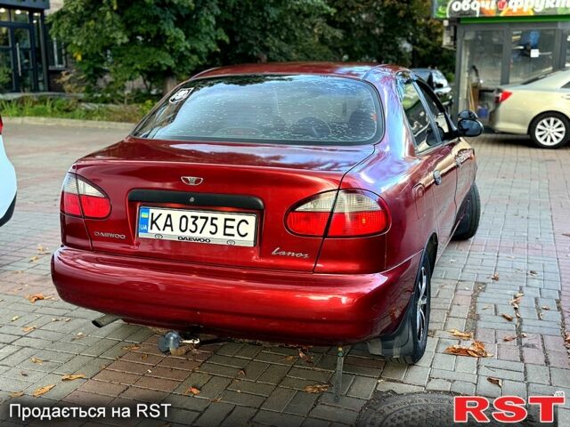 Красный Дэу Ланос, объемом двигателя 1.5 л и пробегом 290 тыс. км за 1950 $, фото 2 на Automoto.ua