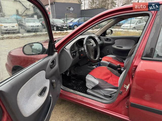 Красный Дэу Ланос, объемом двигателя 1.5 л и пробегом 310 тыс. км за 1850 $, фото 6 на Automoto.ua