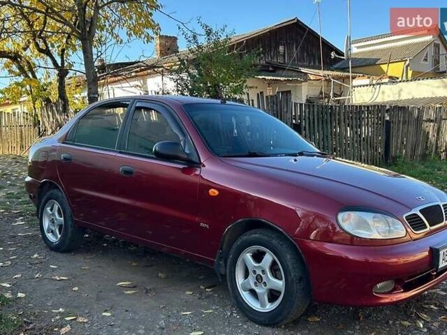 Красный Дэу Ланос, объемом двигателя 1.6 л и пробегом 216 тыс. км за 1900 $, фото 11 на Automoto.ua