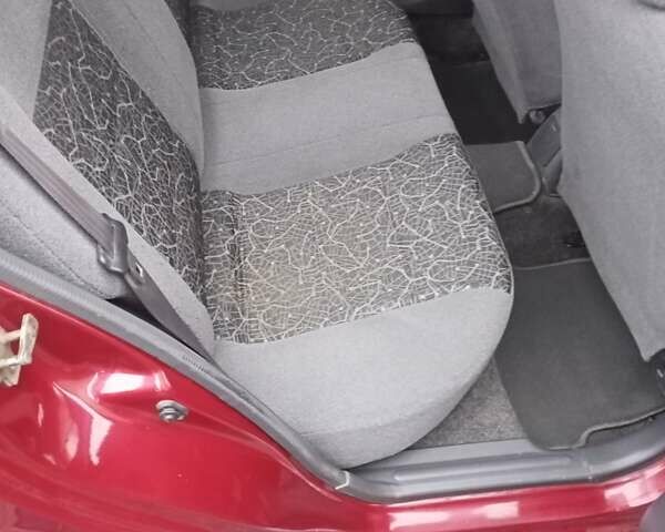 Червоний Деу Ланос, об'ємом двигуна 1.3 л та пробігом 220 тис. км за 1850 $, фото 17 на Automoto.ua