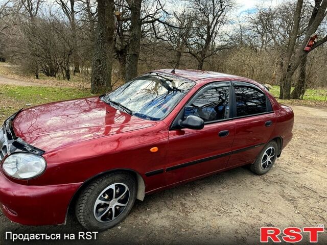 Дэу Ланос 2006 в Новомосковске на Automoto.ua Красный Дэу Ланос, объемом двигателя 1.5 л и пробегом 200 тыс. км за 1750 $, фото 4 на Automoto.ua