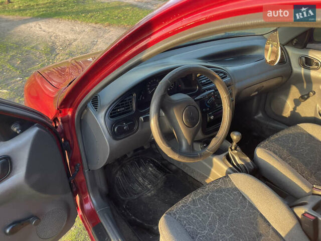 Красный Дэу Ланос, объемом двигателя 1.5 л и пробегом 300 тыс. км за 2999 $, фото 10 на Automoto.ua