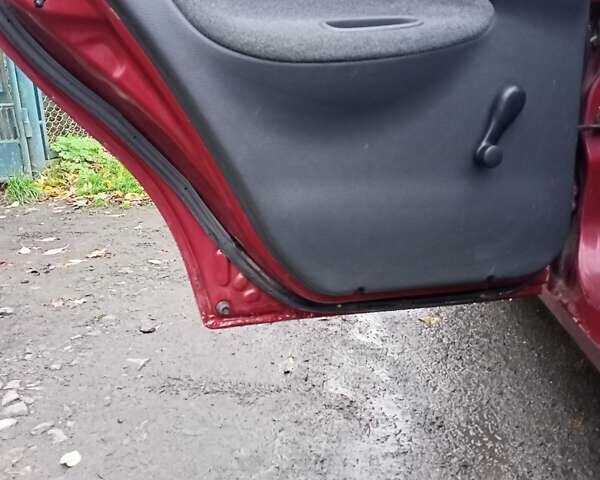 Червоний Деу Ланос, об'ємом двигуна 1.3 л та пробігом 220 тис. км за 1850 $, фото 28 на Automoto.ua