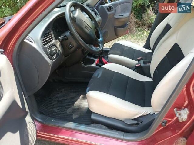 Красный Дэу Ланос, объемом двигателя 1.6 л и пробегом 304 тыс. км за 2900 $, фото 6 на Automoto.ua