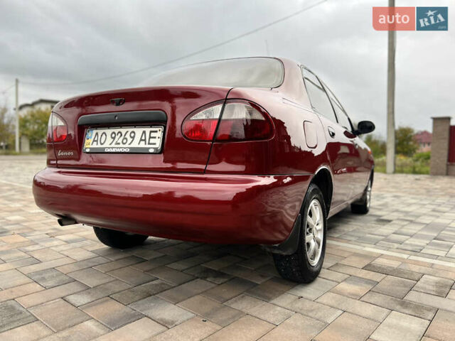 Красный Дэу Ланос, объемом двигателя 1.5 л и пробегом 250 тыс. км за 1950 $, фото 22 на Automoto.ua