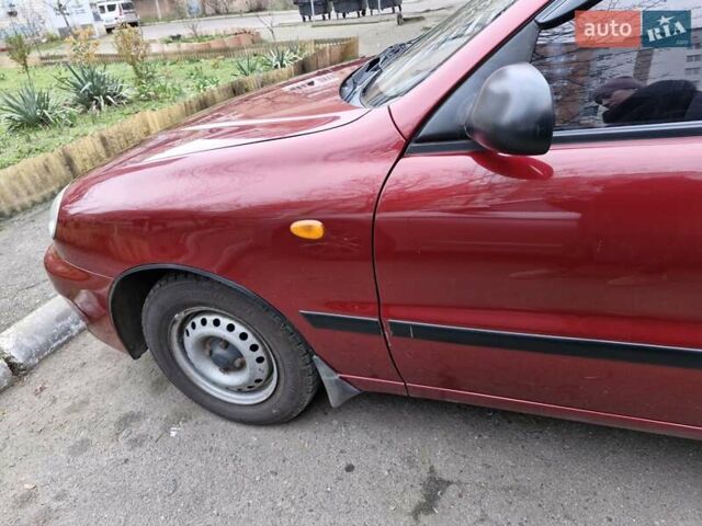 Красный Дэу Ланос, объемом двигателя 1.5 л и пробегом 146 тыс. км за 2300 $, фото 10 на Automoto.ua