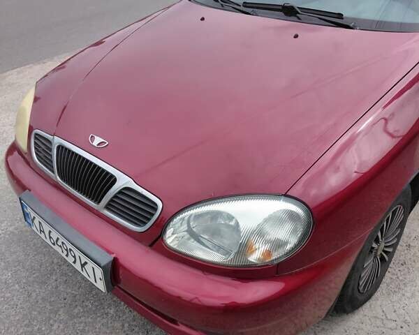 Красный Дэу Ланос, объемом двигателя 1.5 л и пробегом 309 тыс. км за 2200 $, фото 4 на Automoto.ua