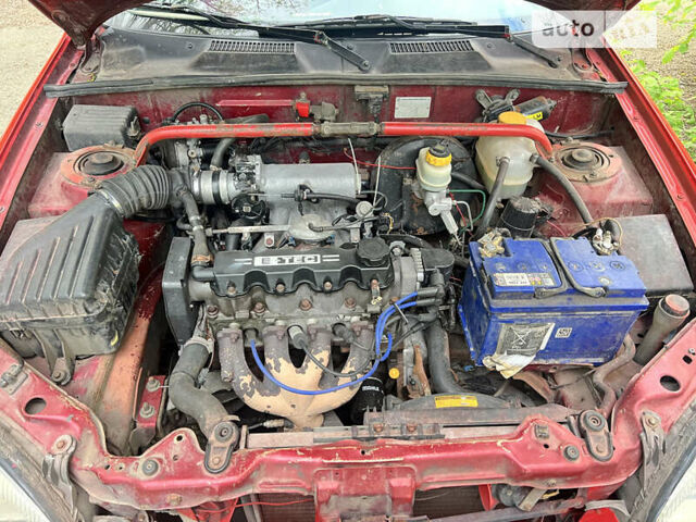 Червоний Деу Ланос, об'ємом двигуна 1.5 л та пробігом 270 тис. км за 2000 $, фото 5 на Automoto.ua