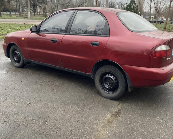 Красный Дэу Ланос, объемом двигателя 1.5 л и пробегом 250 тыс. км за 1450 $, фото 2 на Automoto.ua