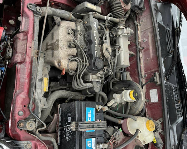 Красный Дэу Ланос, объемом двигателя 1.5 л и пробегом 310 тыс. км за 1850 $, фото 9 на Automoto.ua