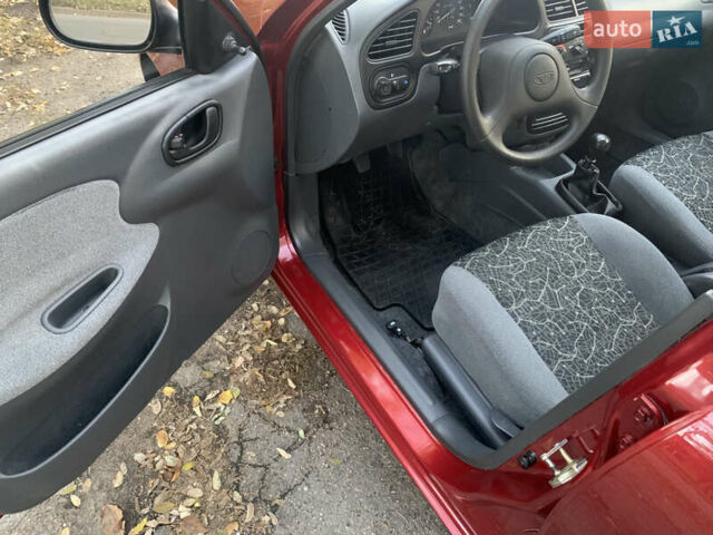 Красный Дэу Ланос, объемом двигателя 1.5 л и пробегом 51 тыс. км за 3800 $, фото 7 на Automoto.ua