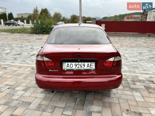 Красный Дэу Ланос, объемом двигателя 1.5 л и пробегом 250 тыс. км за 1950 $, фото 25 на Automoto.ua