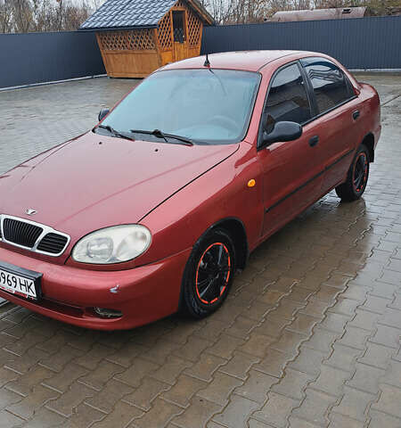 Красный Дэу Ланос, объемом двигателя 1.5 л и пробегом 153 тыс. км за 2000 $, фото 1 на Automoto.ua