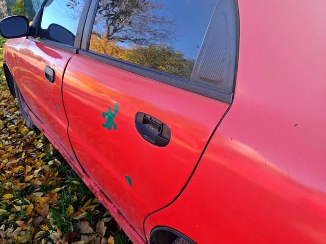 Деу Ланос 2006 у Смеле на Automoto.ua Червоний Деу Ланос, об'ємом двигуна 1.5 л та пробігом 316 тис. км за 1000 $, фото 6 на Automoto.ua