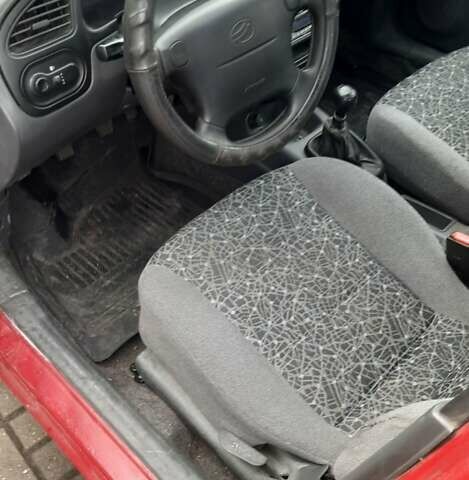 Червоний Деу Ланос, об'ємом двигуна 1.5 л та пробігом 151 тис. км за 1350 $, фото 10 на Automoto.ua