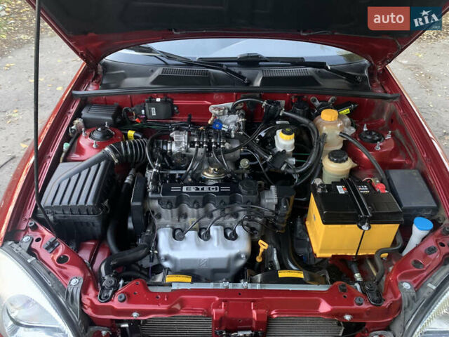 Деу Ланос 2006 у Запоріжжя на Automoto.ua Червоний Деу Ланос, об'ємом двигуна 1.5 л та пробігом 51 тис. км за 3800 $, фото 4 на Automoto.ua