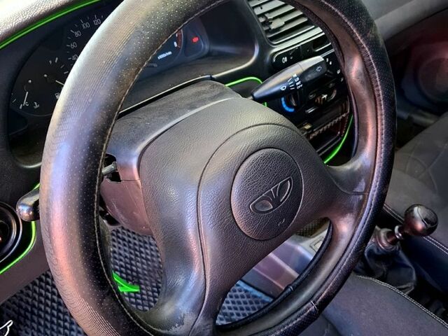 Деу Ланос 2006 у Смеле на Automoto.ua Червоний Деу Ланос, об'ємом двигуна 1.5 л та пробігом 316 тис. км за 1000 $, фото 12 на Automoto.ua