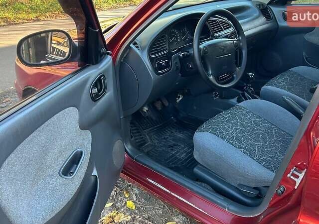 Красный Дэу Ланос, объемом двигателя 1.6 л и пробегом 216 тыс. км за 1900 $, фото 13 на Automoto.ua