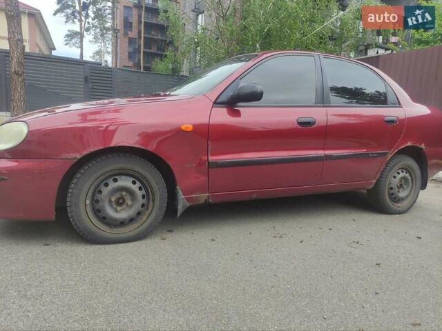 Красный Дэу Ланос, объемом двигателя 1.6 л и пробегом 186 тыс. км за 2200 $, фото 2 на Automoto.ua