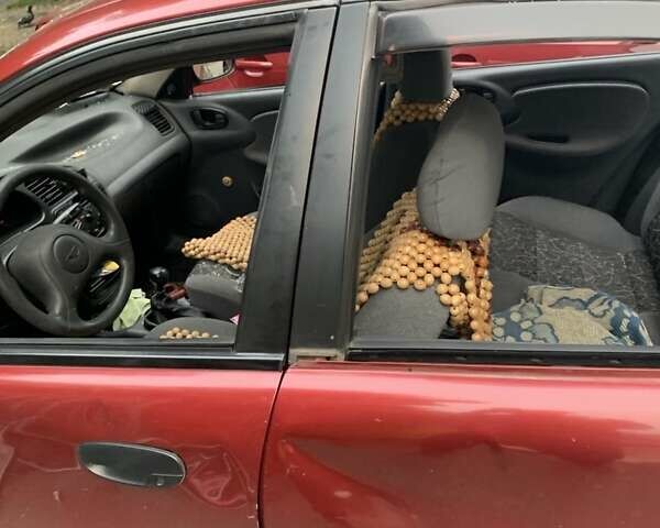 Красный Дэу Ланос, объемом двигателя 1.5 л и пробегом 120 тыс. км за 1600 $, фото 8 на Automoto.ua