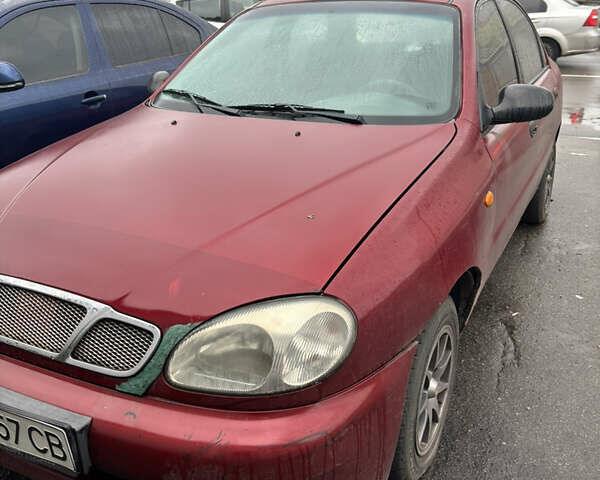Красный Дэу Ланос, объемом двигателя 1.3 л и пробегом 283 тыс. км за 1500 $, фото 1 на Automoto.ua