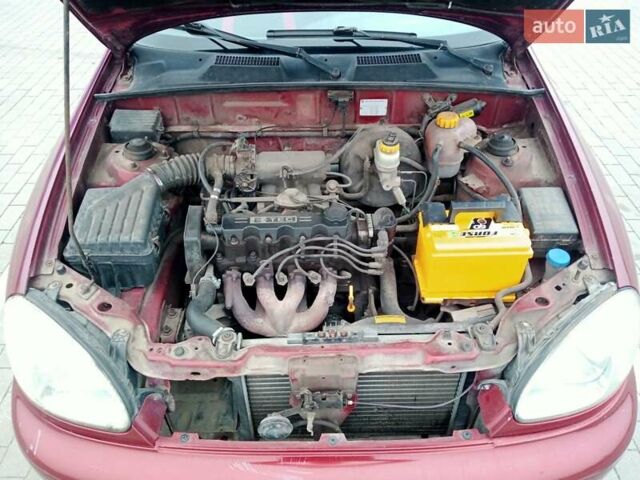 Красный Дэу Ланос, объемом двигателя 1.5 л и пробегом 322 тыс. км за 2300 $, фото 15 на Automoto.ua