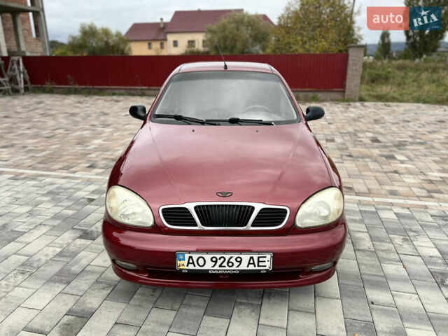 Красный Дэу Ланос, объемом двигателя 1.5 л и пробегом 250 тыс. км за 1950 $, фото 16 на Automoto.ua
