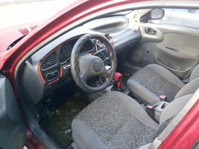 Красный Дэу Ланос, объемом двигателя 1.5 л и пробегом 175 тыс. км за 1000 $, фото 5 на Automoto.ua