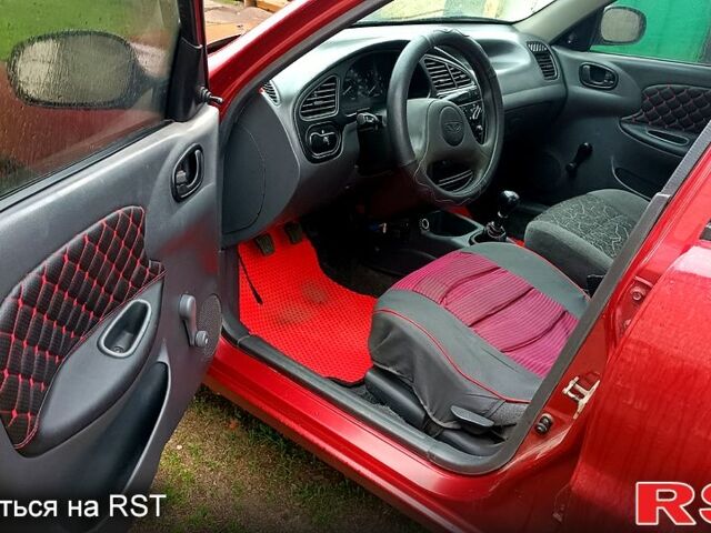 Красный Дэу Ланос, объемом двигателя 1.5 л и пробегом 163 тыс. км за 2200 $, фото 5 на Automoto.ua