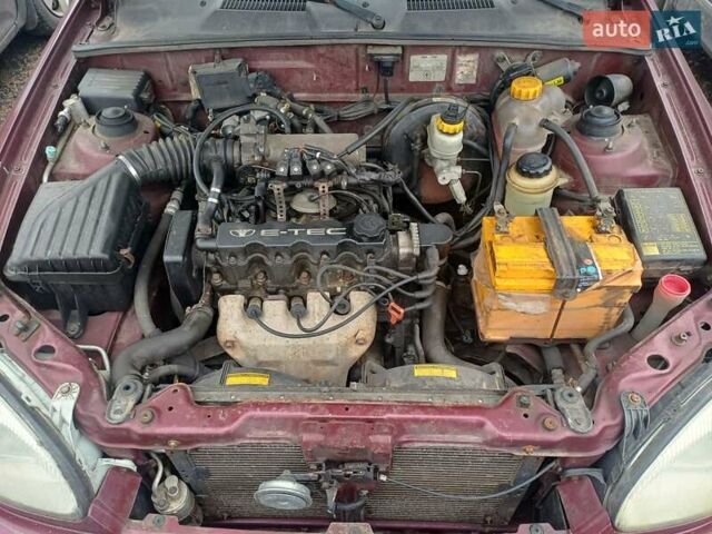 Красный Дэу Ланос, объемом двигателя 1.5 л и пробегом 501 тыс. км за 2400 $, фото 5 на Automoto.ua