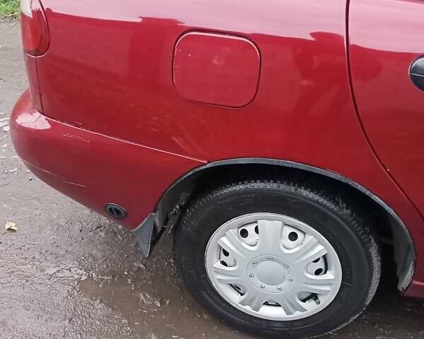 Червоний Деу Ланос, об'ємом двигуна 1.3 л та пробігом 220 тис. км за 1850 $, фото 4 на Automoto.ua