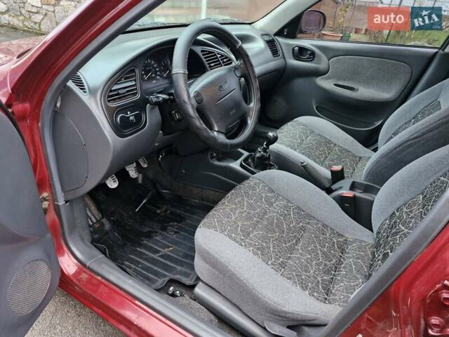 Красный Дэу Ланос, объемом двигателя 1.6 л и пробегом 163 тыс. км за 2650 $, фото 14 на Automoto.ua