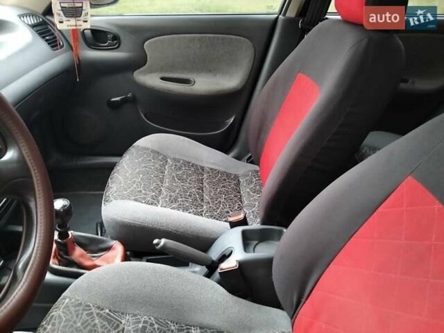 Красный Дэу Ланос, объемом двигателя 1.5 л и пробегом 191 тыс. км за 2500 $, фото 9 на Automoto.ua