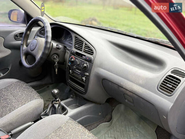 Красный Дэу Ланос, объемом двигателя 1.5 л и пробегом 224 тыс. км за 1750 $, фото 8 на Automoto.ua