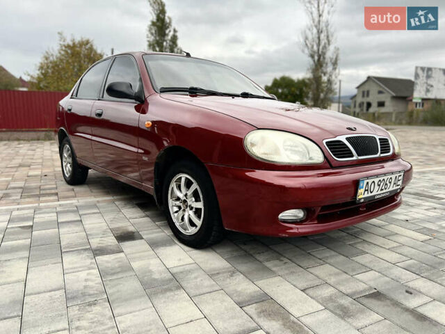 Красный Дэу Ланос, объемом двигателя 1.5 л и пробегом 250 тыс. км за 1950 $, фото 34 на Automoto.ua